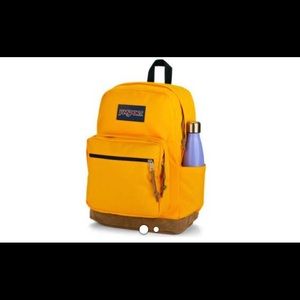 Yellow jansport backpack